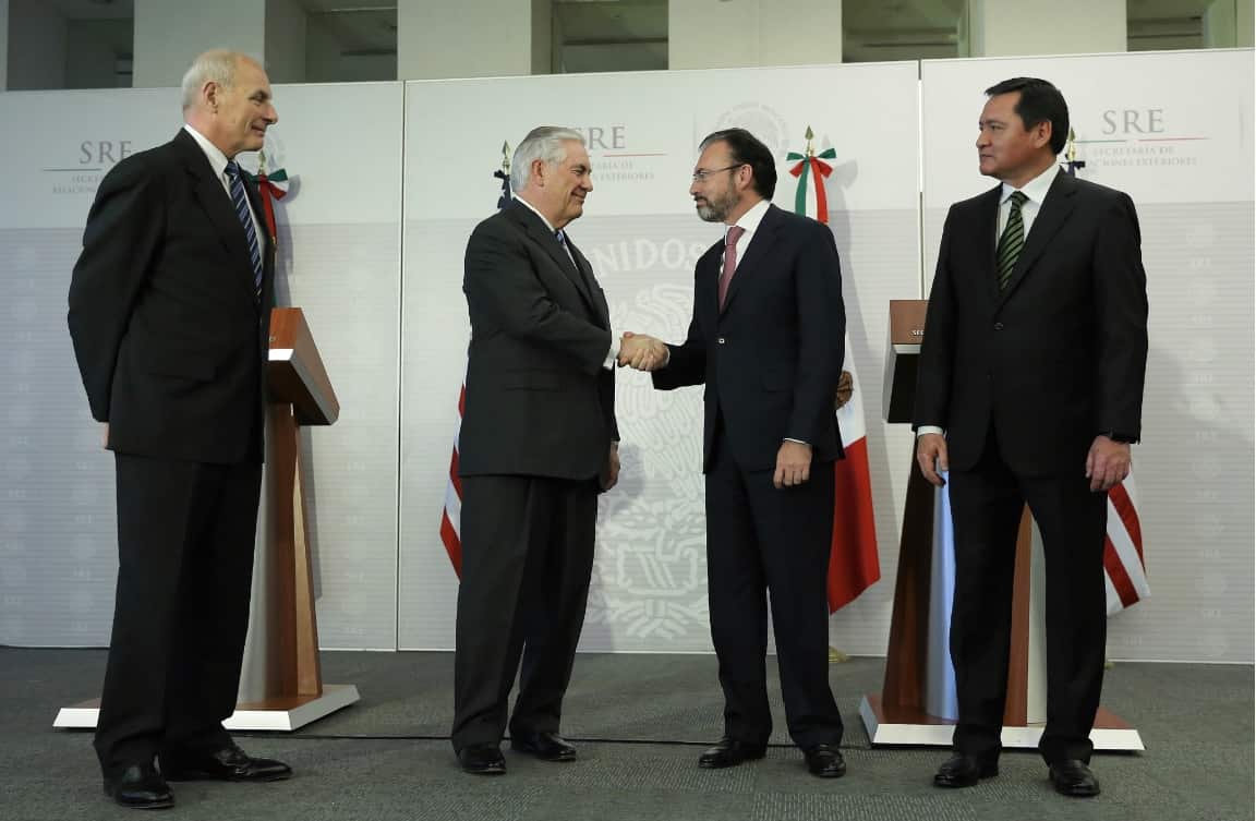 FILE: Rex Tillerson and Luis Videgaray shake hands at a press conference in Mexico City about Washington's plans to crack down on illegal immigration