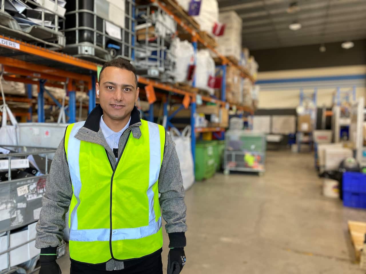 Meyssam Ghasemzadeh collects discarded office materials for Green Collect.