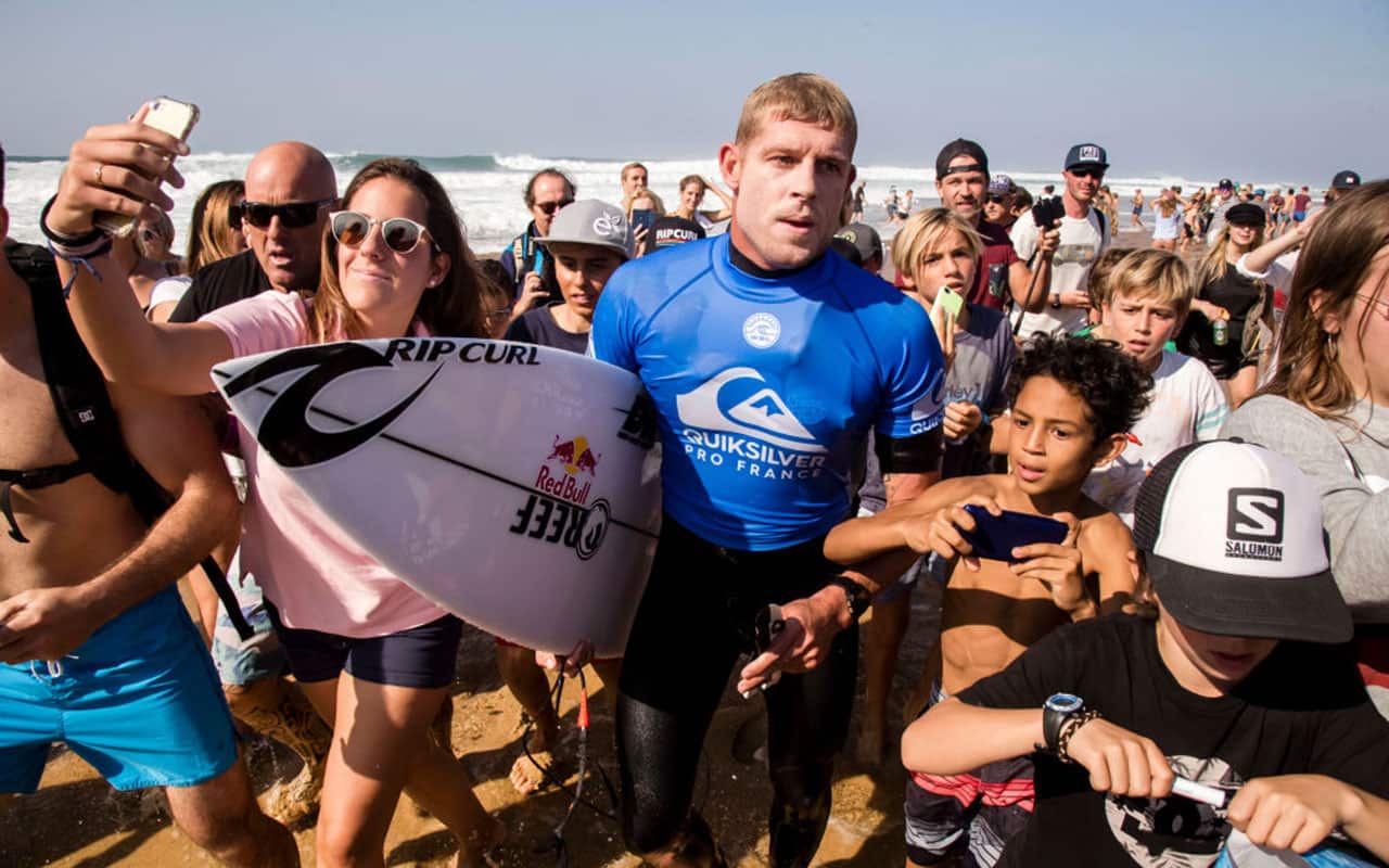 Mick Fanning takes a crowd bath during the Quicksilver Pro France surf competition on October 12, 2017.