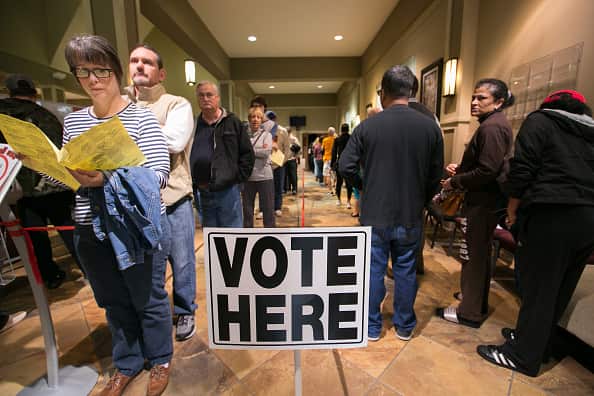 Voters line-up to cast their ballots at a polling station in Georgia. 