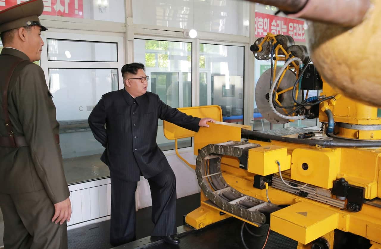 North Korean leader Kim Jong Un visits the Chemical Material Institute of Academy of Defense Science on Aug 23 (AAP)
