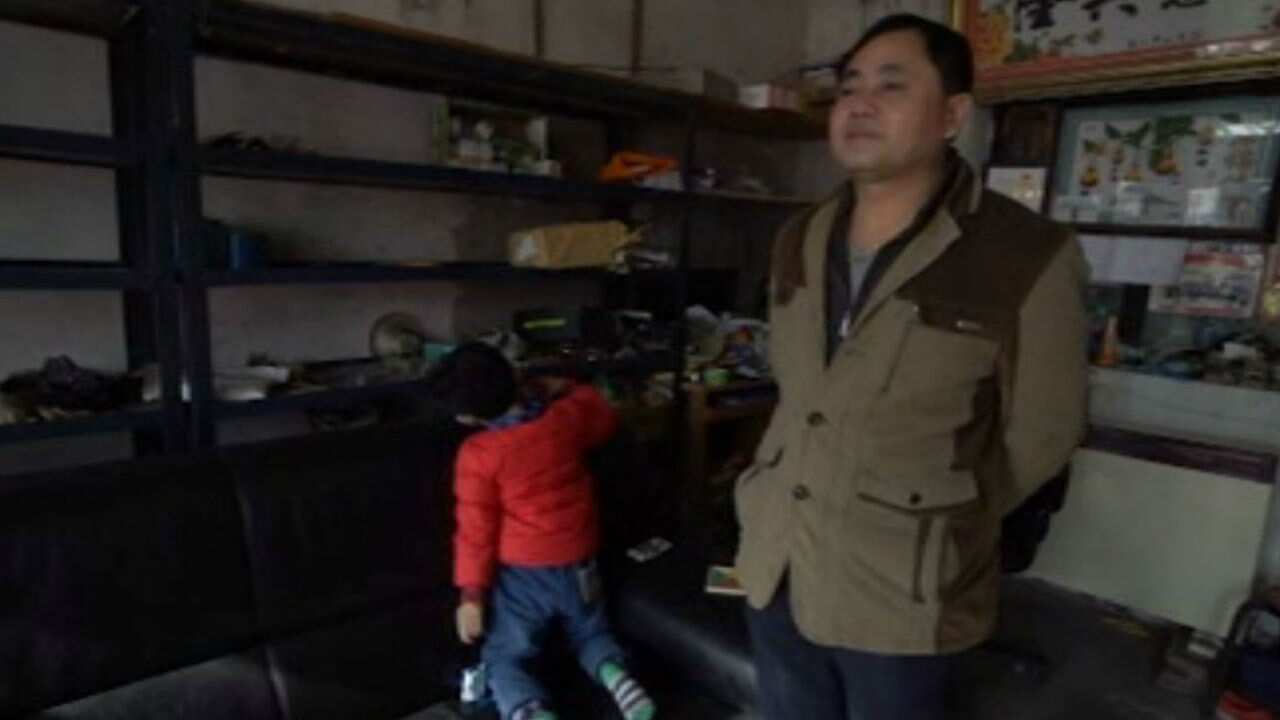 Convenience store owner Min Shu Guo and his grandson are among those being told to leave.