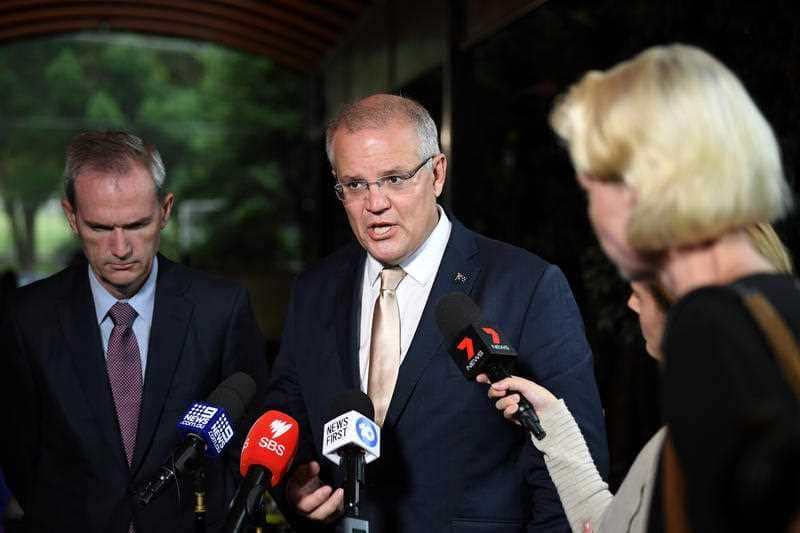 Immigration Minister David Coleman (left) and Prime Minister Scott Morrison.