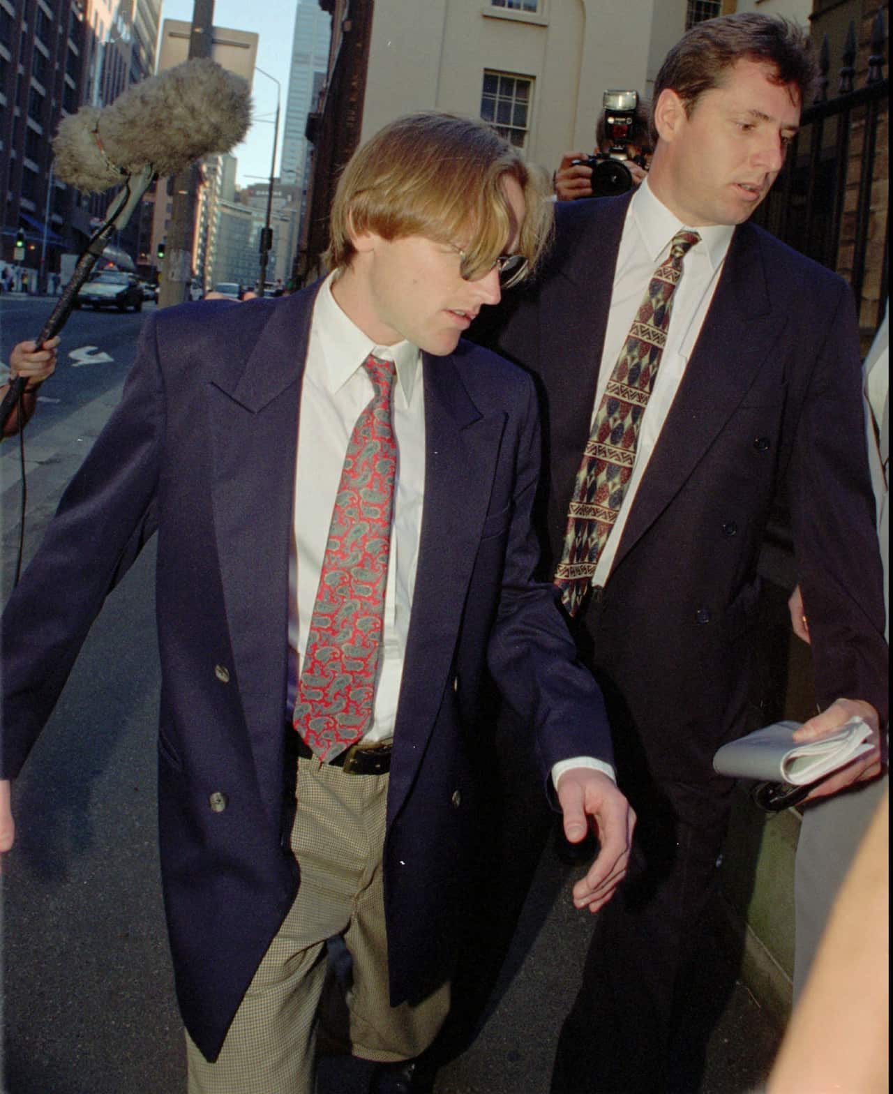 British backpacker Paul Onions, left, is escorted into court during the '96 trial. 