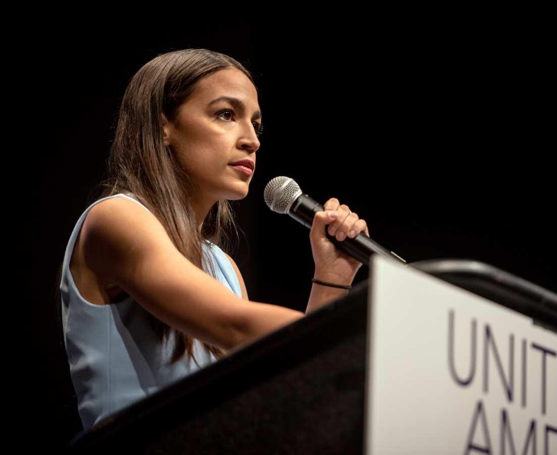 Alexandria Ocasio-Cortez speaks at a campaign event for James Thompson, a Kansas House candidate, in Wichita on Friday, July 20, 2018.