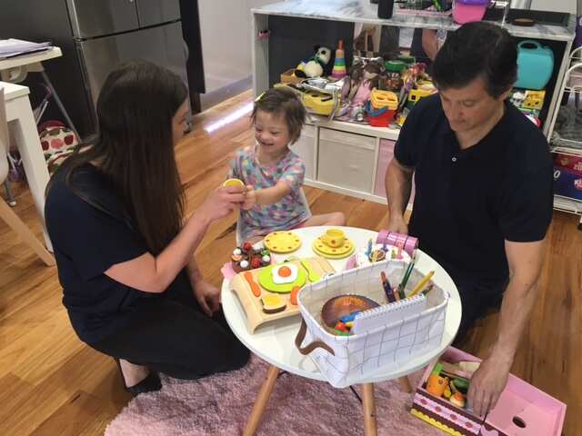 Millie plays with her toys.