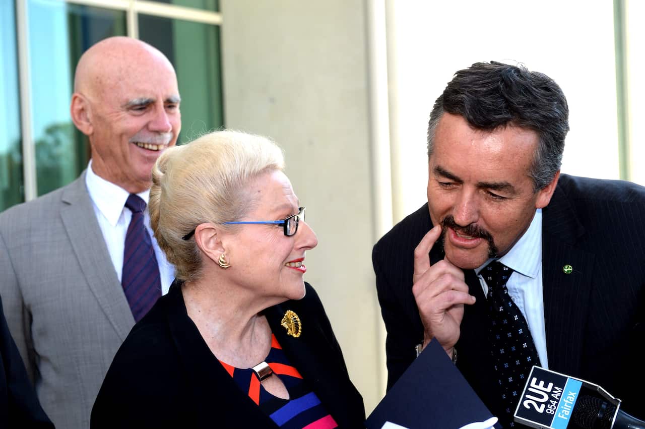 Bronwyn Bishop inspects MP Darren Chester's mo (AAP)