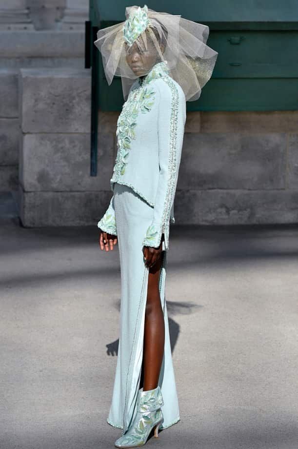 Adut Akech walks the runway during the Chanel Haute Couture Fall Winter 2018/2019 fashion show as part of Paris Fashion Week 