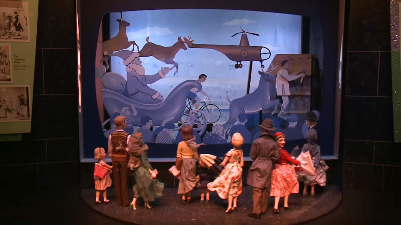 A miniature replica of the first Christmas window from 1956