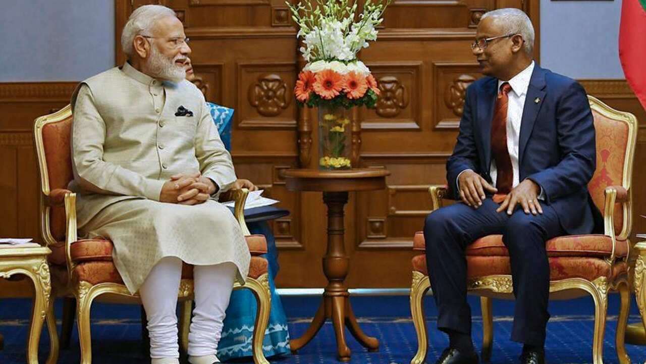 Indian Prime Minister Narendra Modi, left and Maldives President Ibrahim Mohamed Solih sit during their meeting in Maldives.