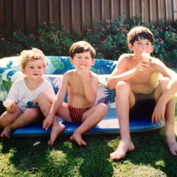 Moises Henriques, right, and his two younger brothers. 