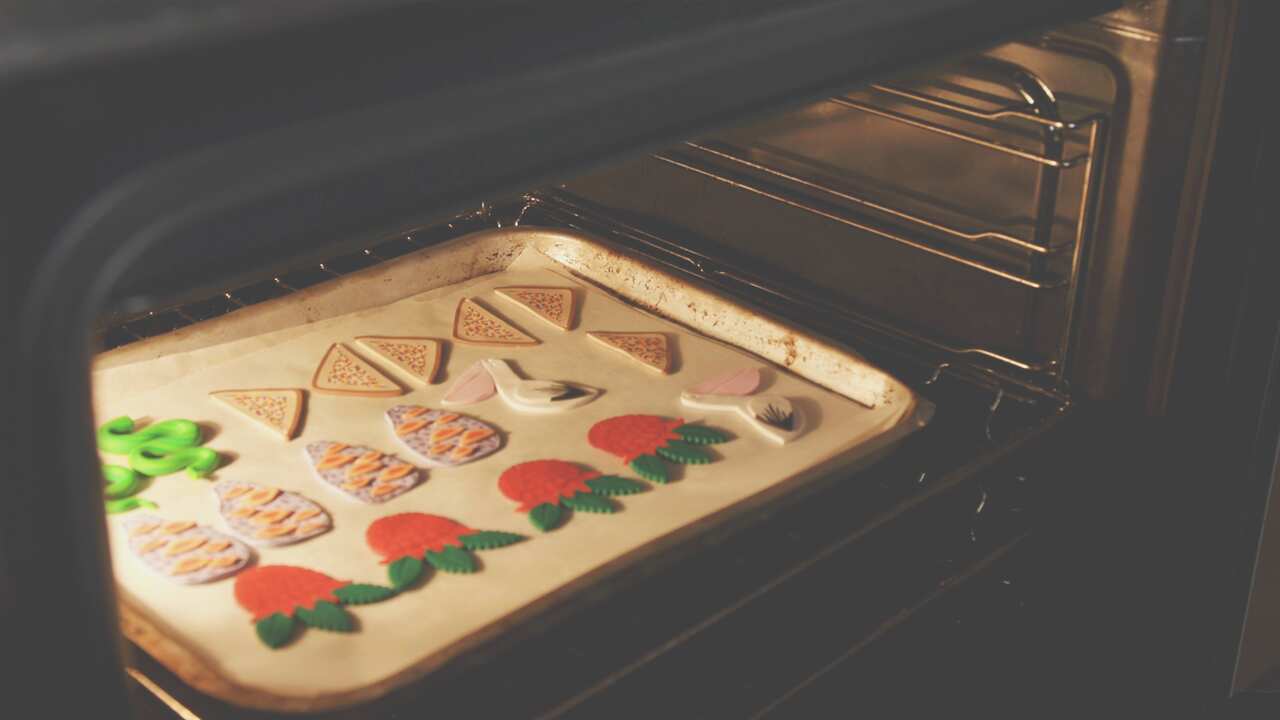 Molly Coombs Marr uses polymerclay, a plastic based clay that sets in the oven to create her pieces. 