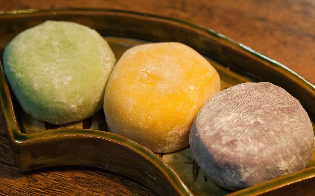 Mochi is a Japanese rice cake made of glutinous rice pounded into paste and then molded into shape.