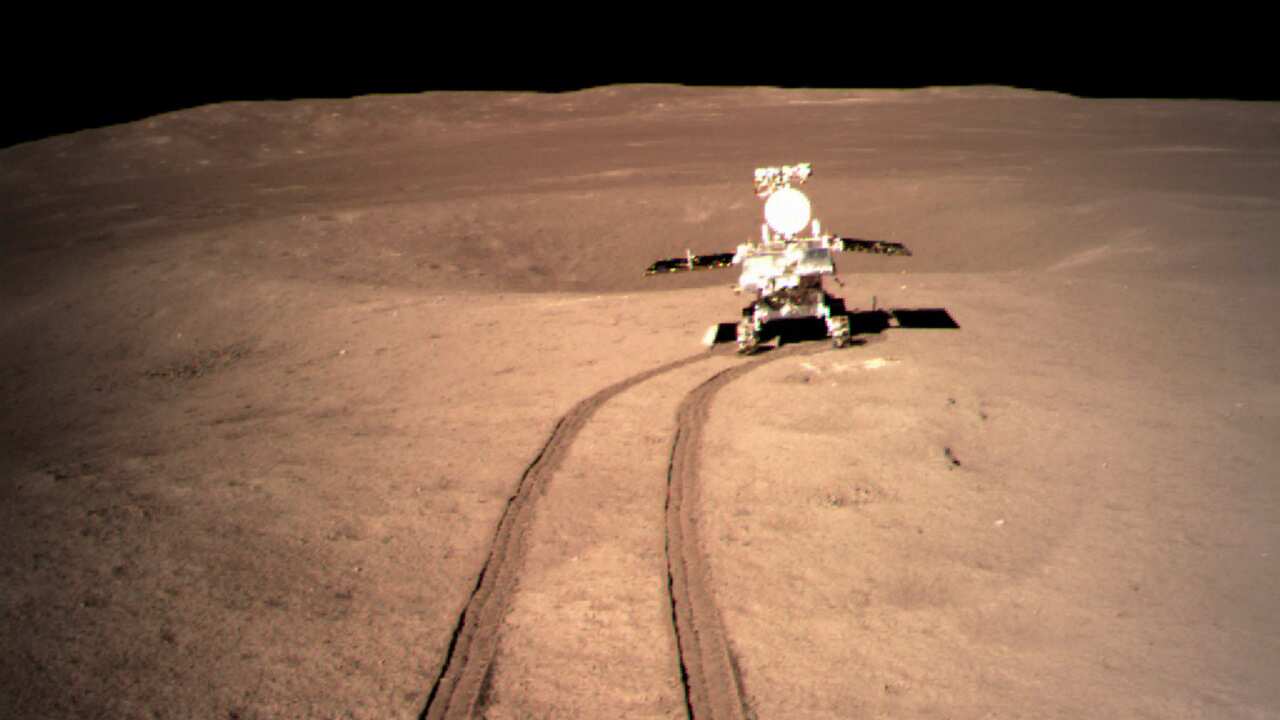Yutu-2, China's lunar rover, leaves wheel marks after leaving the lander that touched down on the surface of the far side of the moon. 
