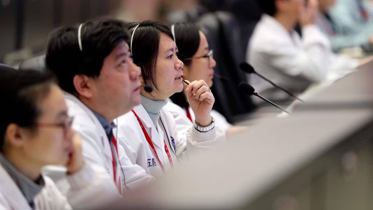 Technicians work at the Beijing Aerospace Control Center (BACC) in Beijing, capital of China on 11/1/19.