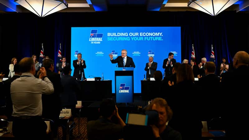 Scott Morrison waves speaking at the 61st Federal Council of the Liberal Party of Australia.
