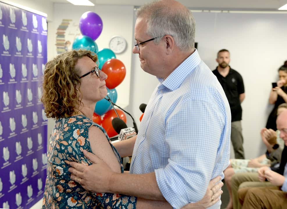 Prime Minister Scott Morrison with Fiona Ryan who lost her daughter Tess to an eating disorder.