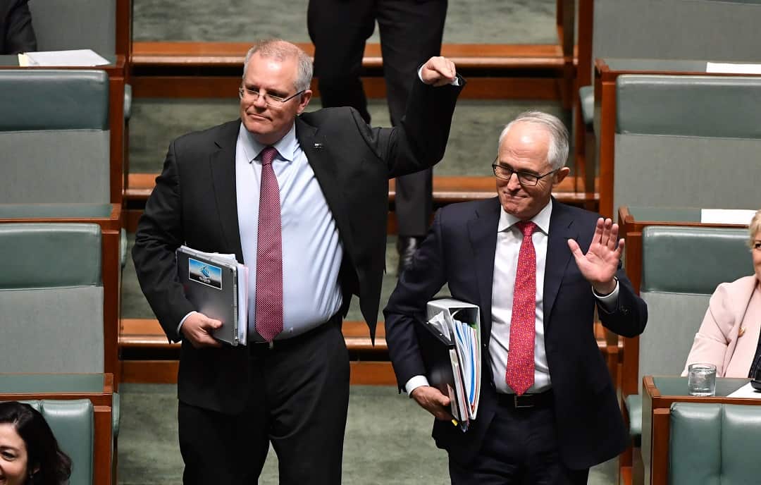 Treasurer Scott Morrison and Prime Minister Malcolm Turnbull during Question Time in the House of Representatives at Parliament House in Canberra, Tuesday, August 21, 2018. (AAP Image/Mick Tsikas) NO ARCHIVING