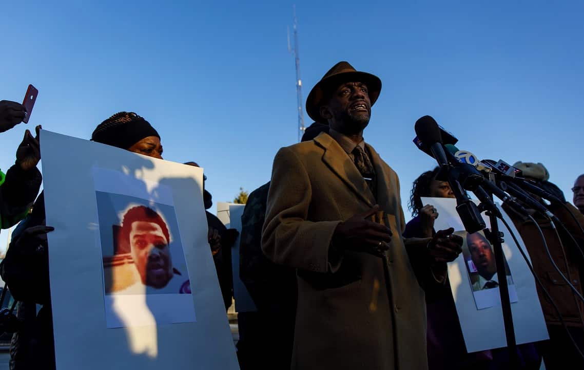 Protesters rally for Jemel Roberson outside the Midlothian Police Department.