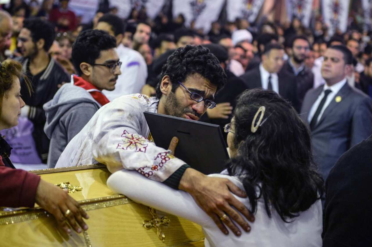 Mourners gather at the funeral for the victims of a bomb explosion at Mar Girgis Coptic church (SBS)