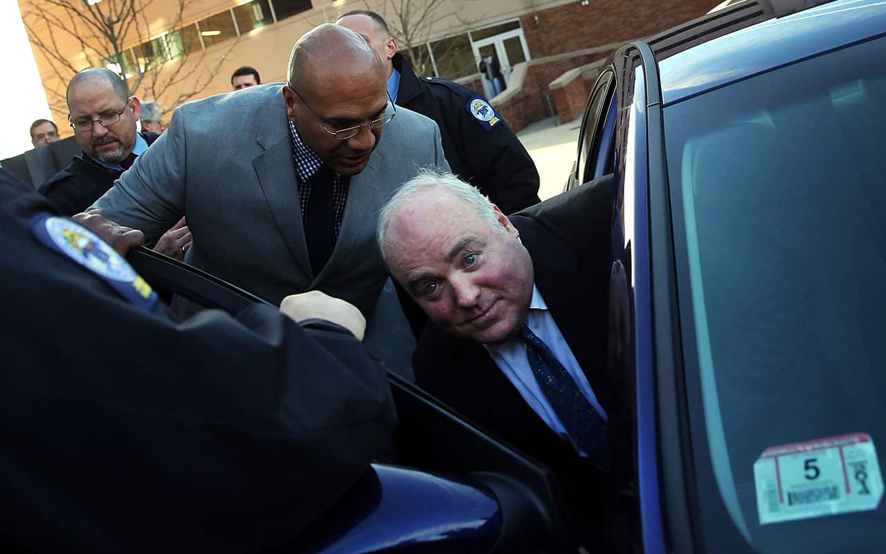 Kennedy relative Michael Skakel gets into a car after walking out of a Stamford, Connecticut courthouse.