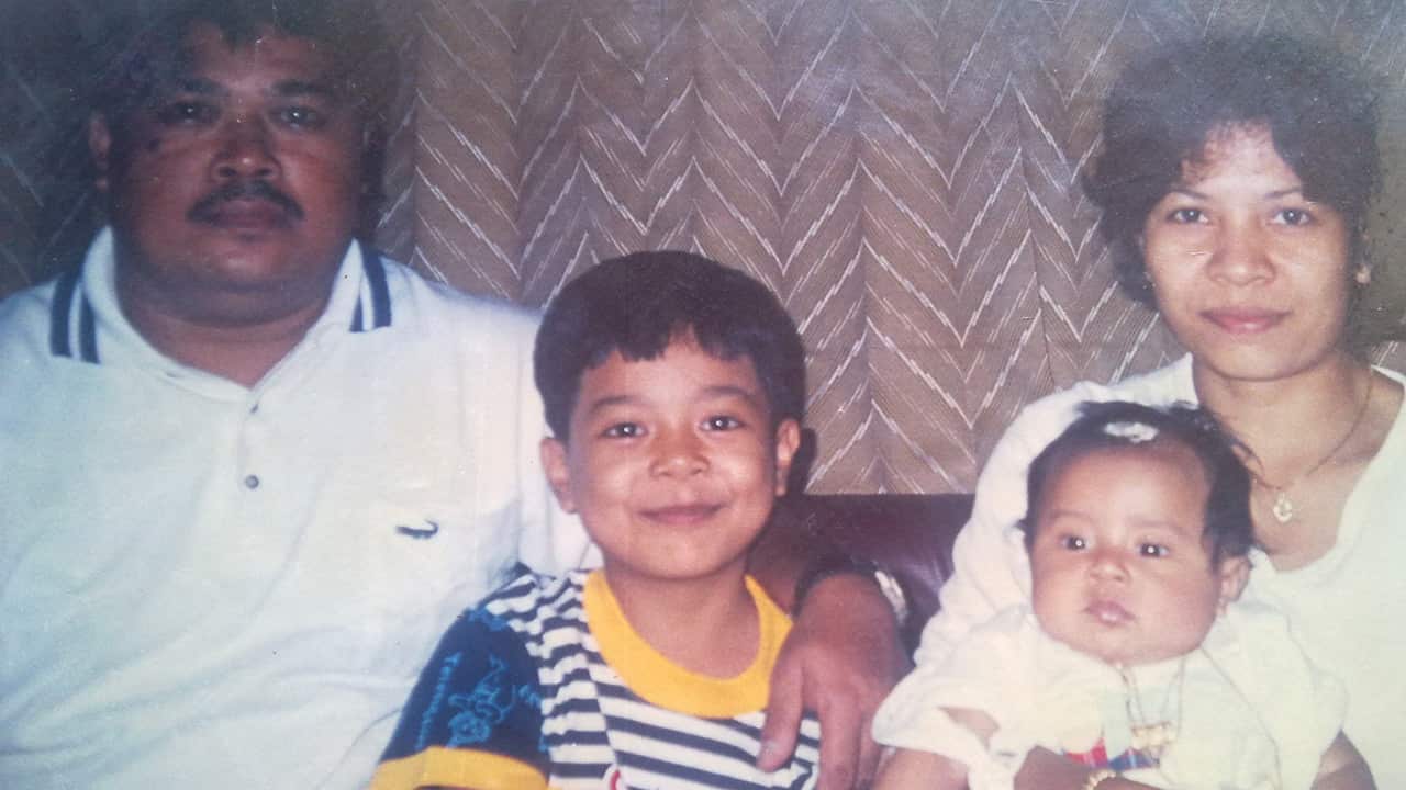 This is the last family photo of Ni Luh with her husband Gede and their two children.