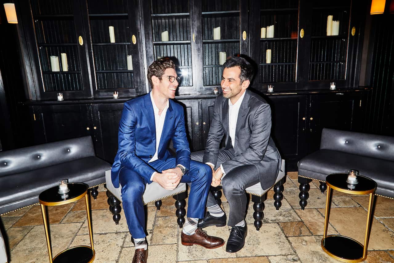 Brian Schaefer, left, and his husband, Stephen Mack, at one of the mini-receptions they held to celebrate their marriage, in New York.