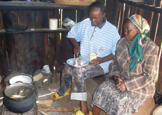 A younger Lucy Gichuhi, left, with her mother in Kenya.