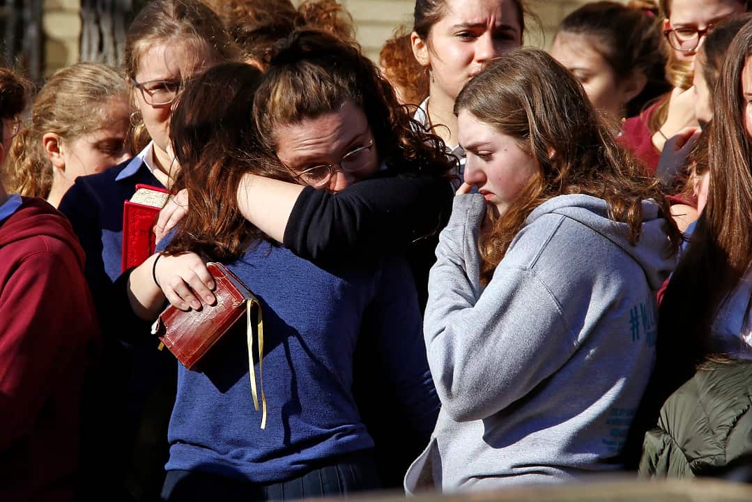 Students from the Yeshiva School in the Squirrel Hill neighbourhood attend the funeral.