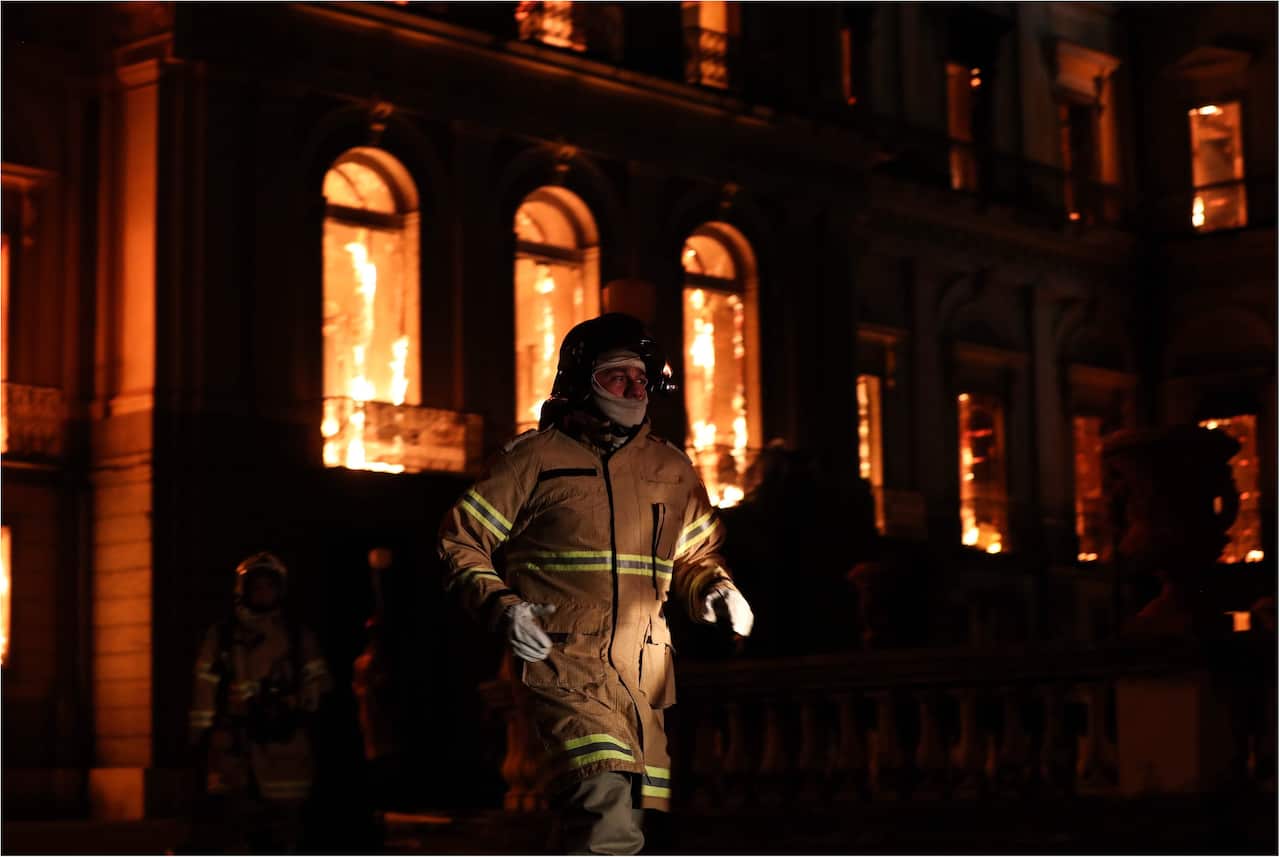 A firefighter in front of the Museum of Rio de Janeiro, one of the oldest in Brazil.