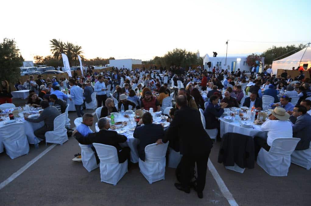 Muslims take part in an Iftar dinner, the meal after sunset during the Muslim holy month of Ramadan, during an event organised by Jews of Djerba (Getty Images)