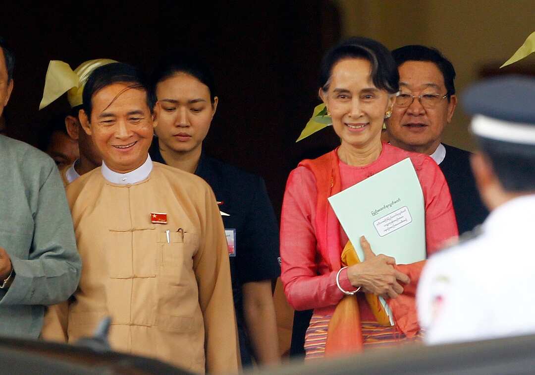 Win Myint (left) with Myanmar's leader Aung San Suu Kyi.