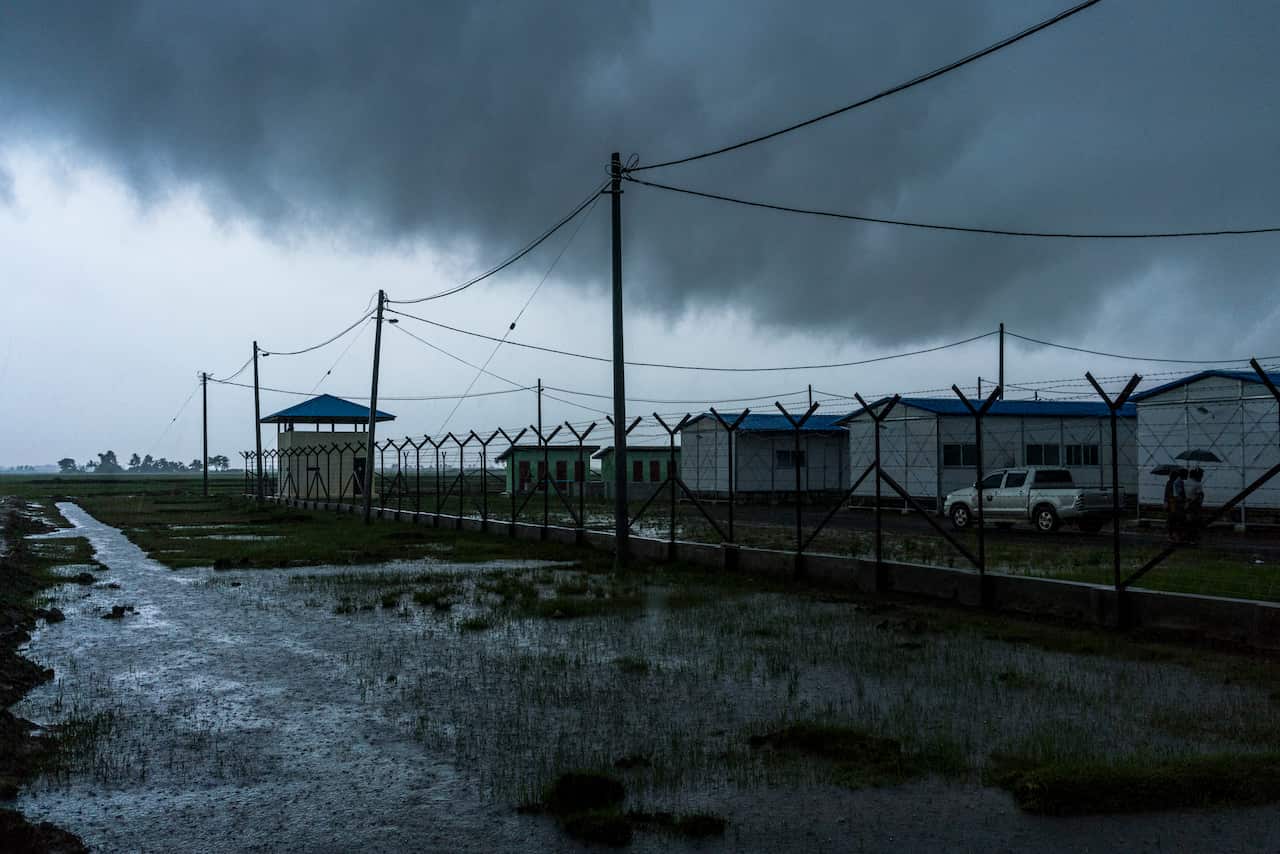 Armed guards survey the area from watchtowers at the Nga Khu Ya repatriation center for Rohingya returning from Bangladesh in Northern Rakine state, Myanmar, July 25, 2018. (Adam Dean/The New York Times)