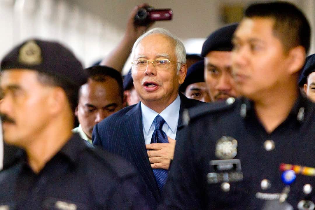 Former Prime Minister Najib Razak has been hit with more than two dozen charges.