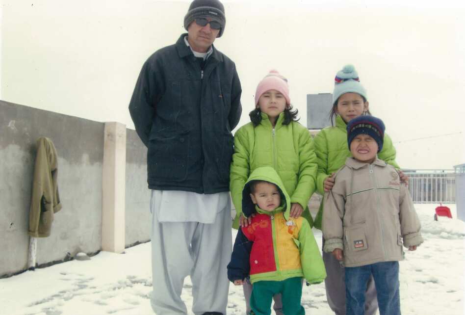 Namatullah Kadrie and his family in the late 1990s, before they fled Afghanistan.