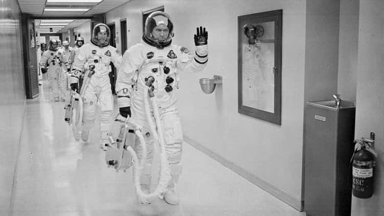 Apollo 8 astronaut Frank Borman leads the way as he, James Lovell and William Anders head out to the launch pad for the historical Apollo mission.