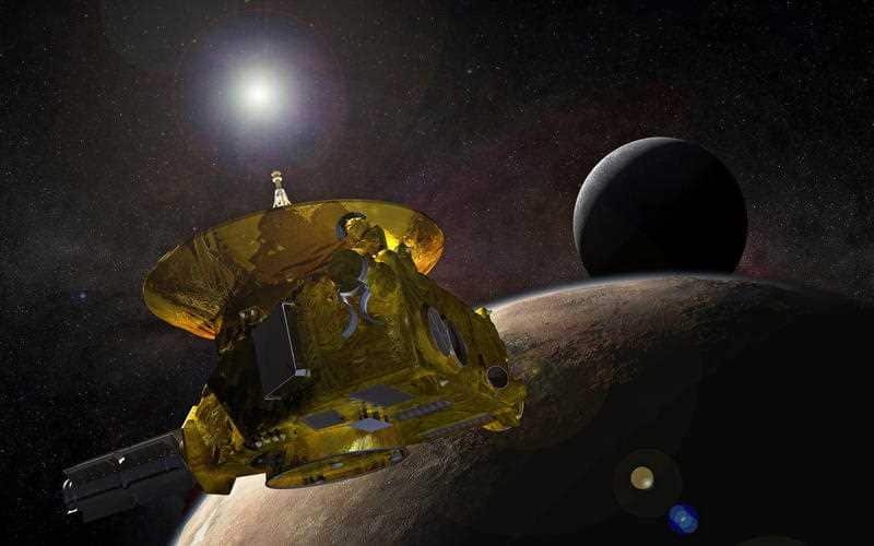 New Horizons spacecraft as it approaches Pluto and its largest moon, Charon, in July 2015.