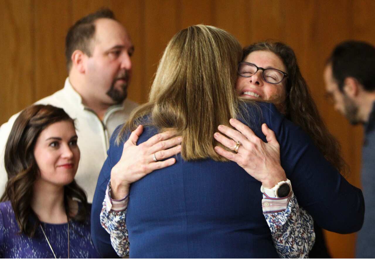 Susan Thomashaw hugs lead prosecutor Angela Povilaitis after the third and final day of sentencing.
