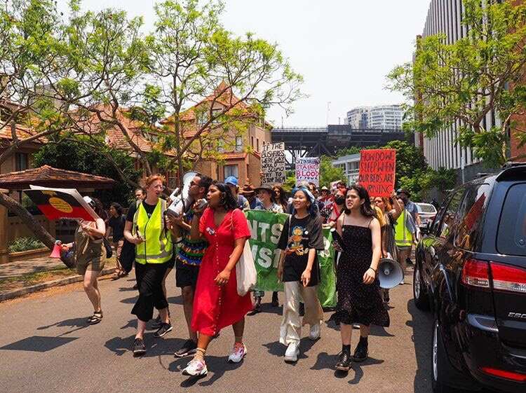 Natasha Abhayawickrama leads a group of climate strikers.