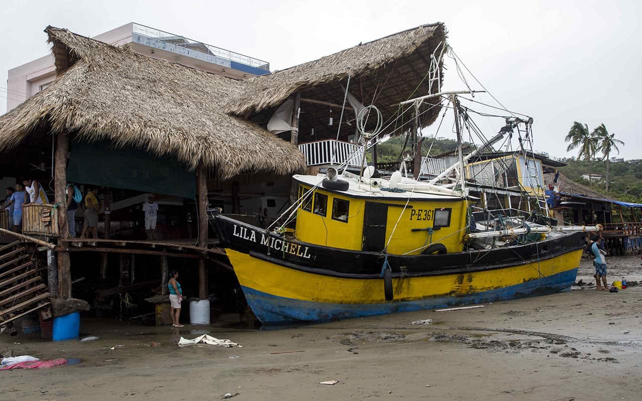 A view of a boat crashed against a restaurant after the passage of tropical storm Nate in San Juan del Sur's bay in Rivas, 140kms west Managua, Nicaragua.