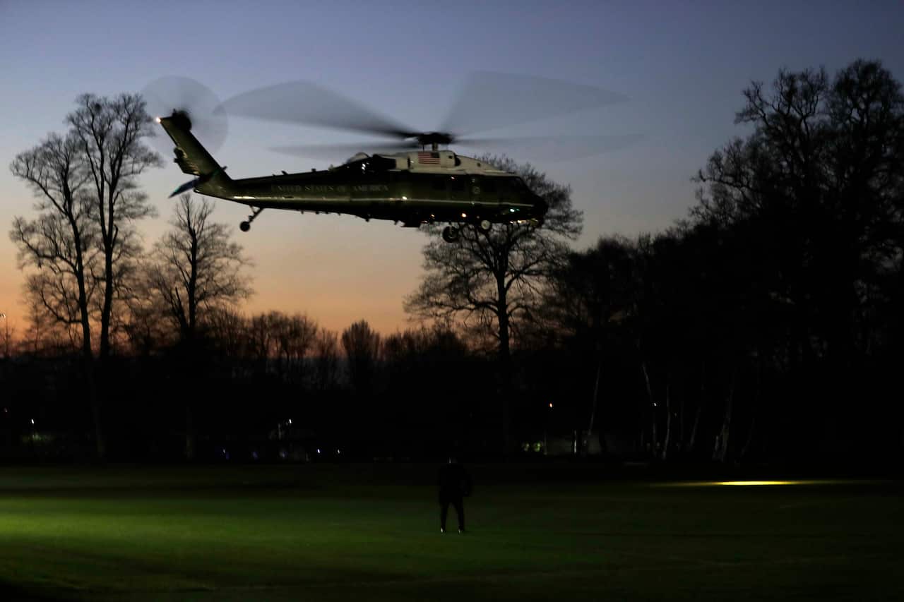 Donald Trump departs the NATO conference on Marine One.