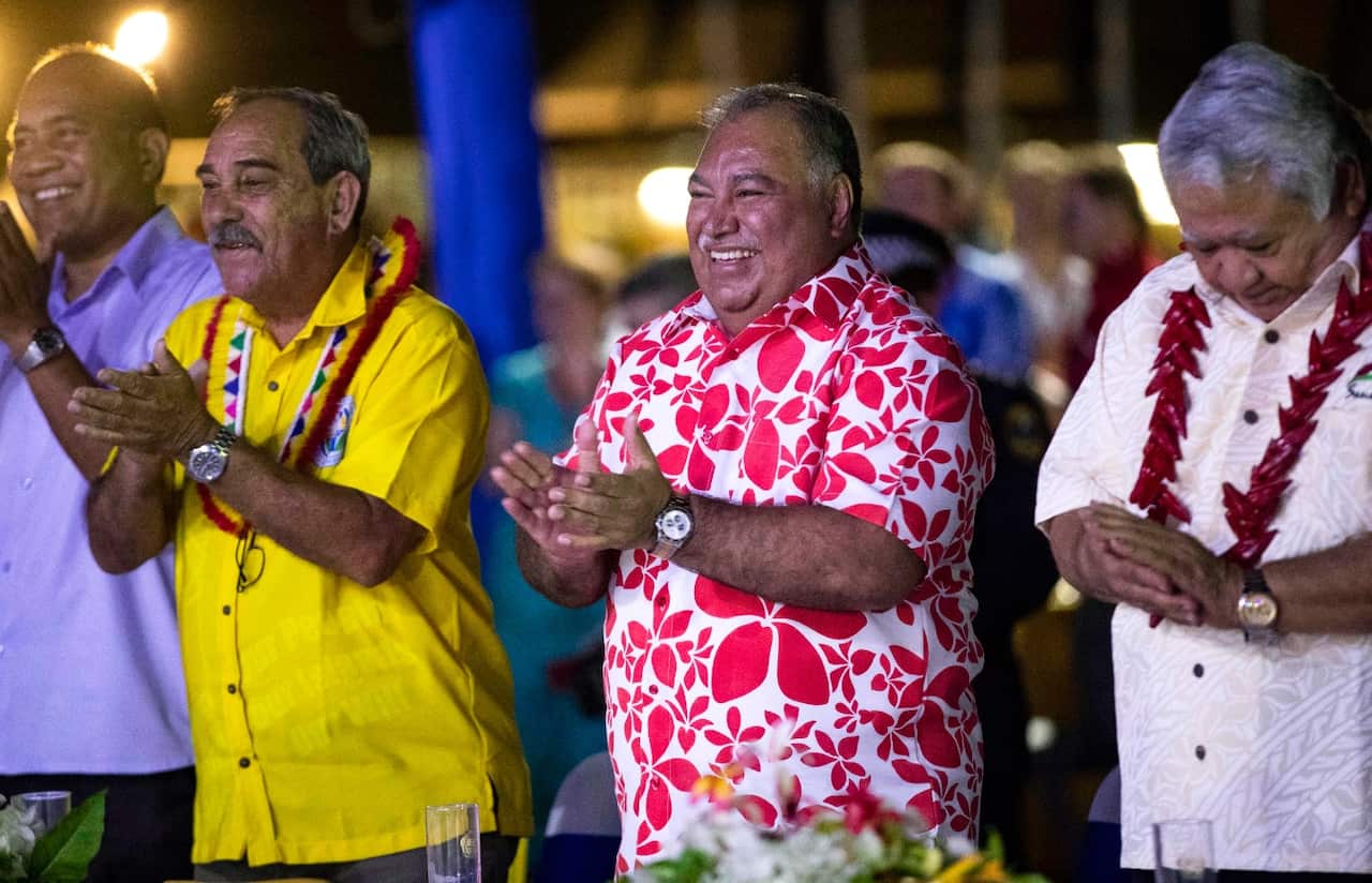 In this Sept. 3, 2018, file photo, Nauru's President Baron Waqa, center, attends the opening ceremony of the Pacific Islands Forum in Nauru.