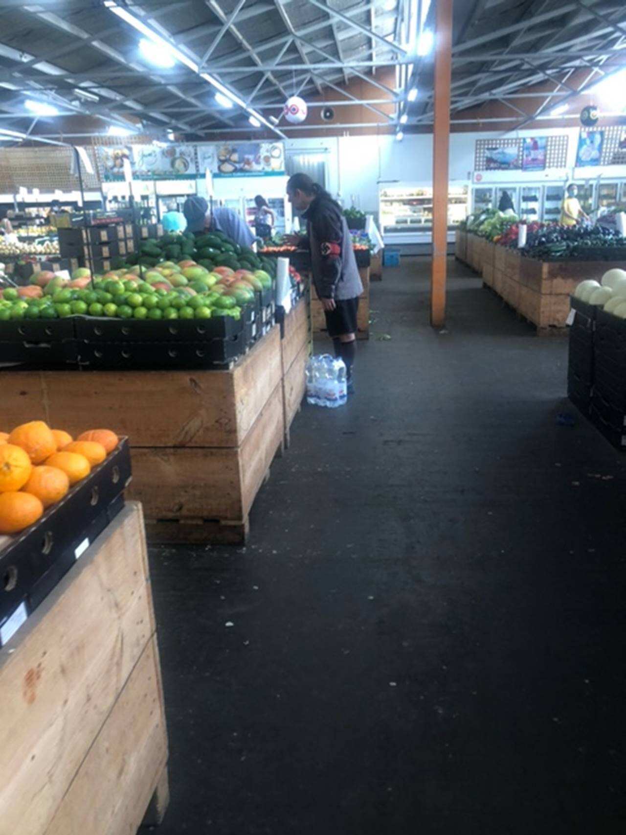 Man seen wearing swastika at Melbourne food market. 