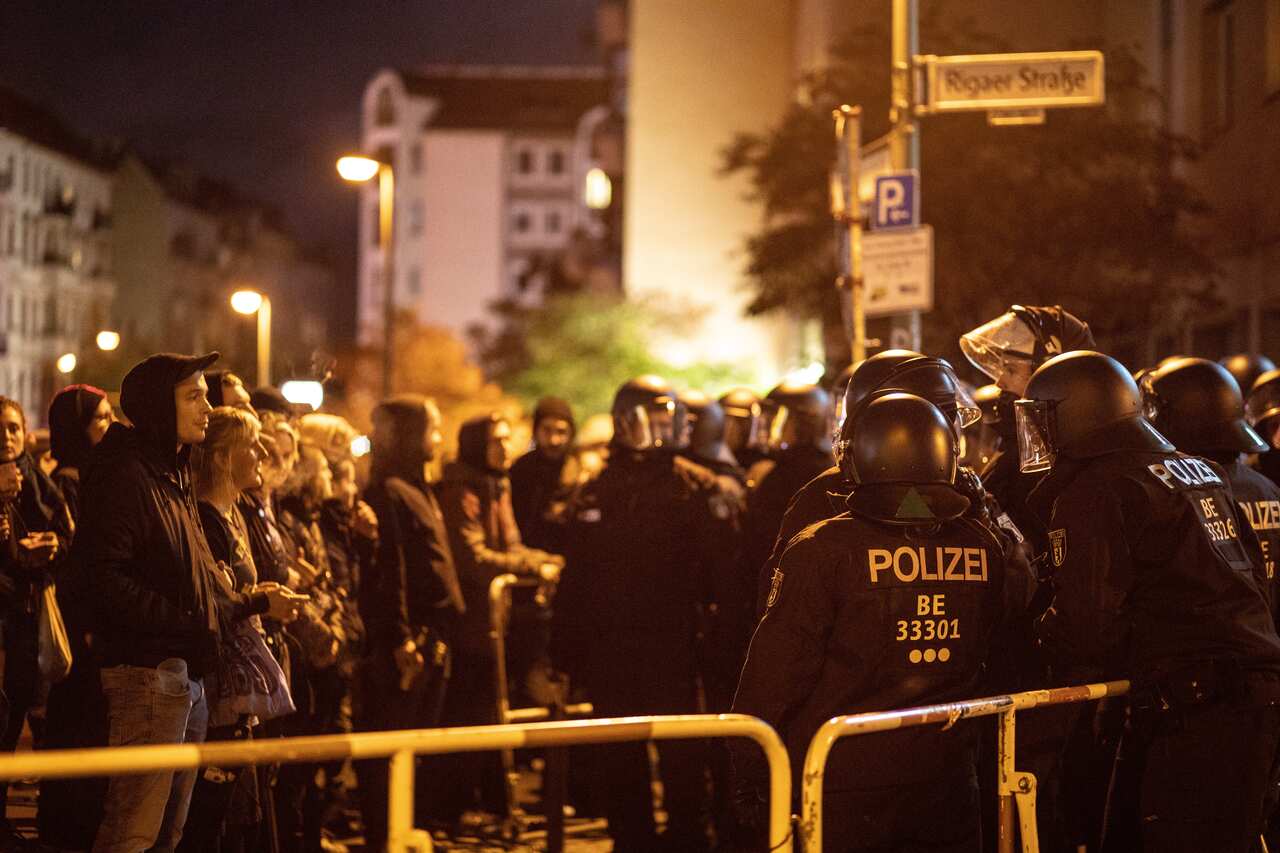 German riot police and left-wing protesters during a demonstration against the far-right PEGIDA group in Berlin.