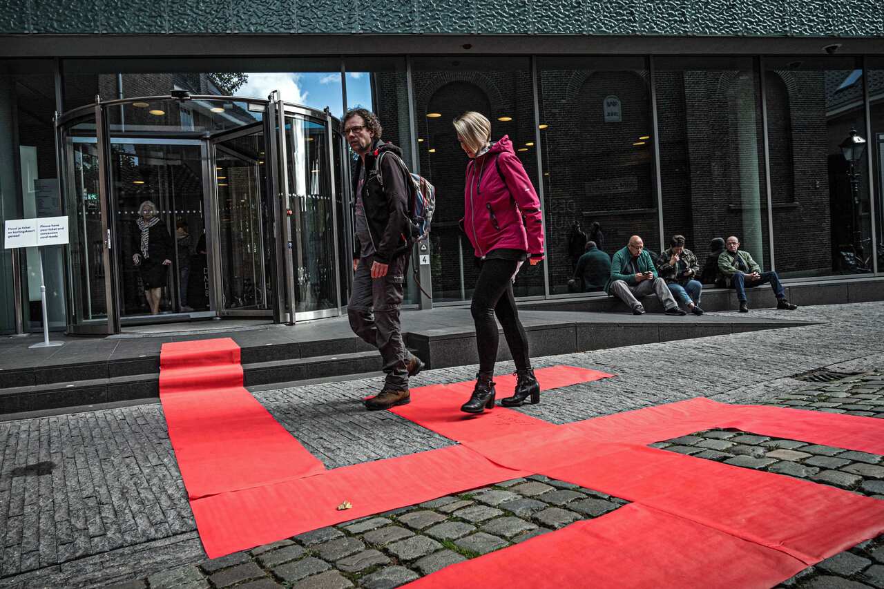 A Swastika by artist Ralph Posset laid out on the footpath during the opening of the Design of the Third Reich exhibition.