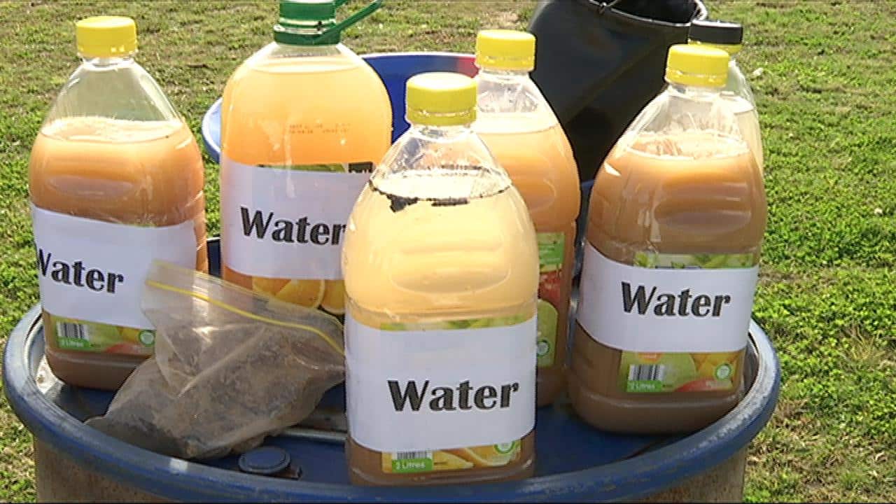 Dirty water - an example of what many refugees are forced to drink. (SBS)