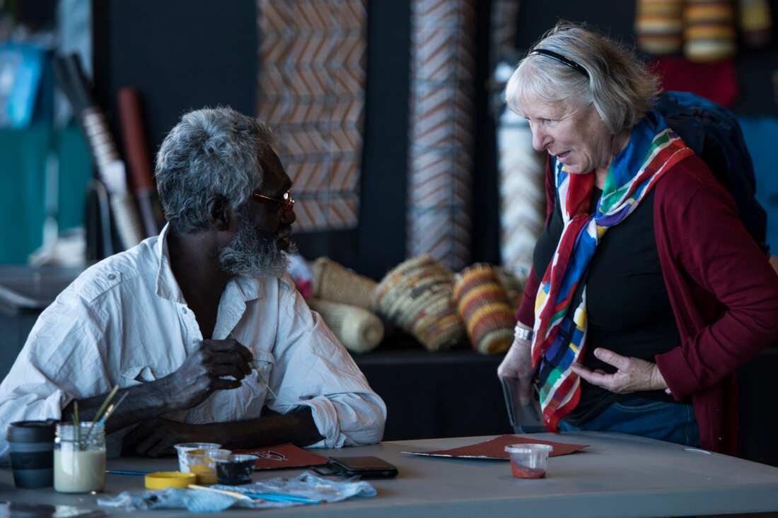 An artist speaks to a customer at last year's National Indigenous Art Fair.