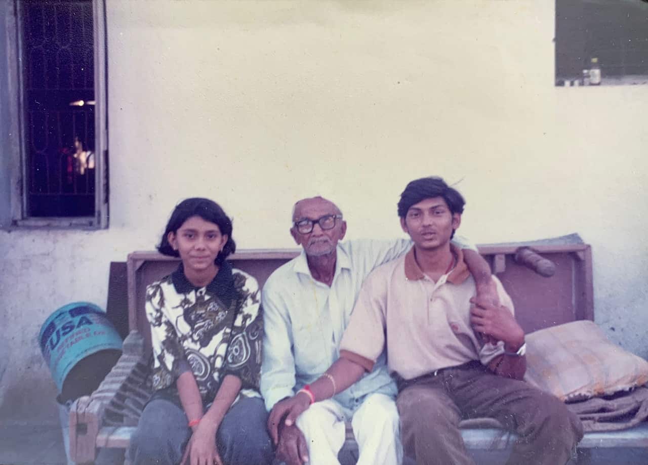 Nilesh pictured with his grandfather in India.