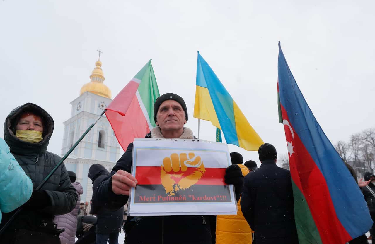 Ukrainians and activists from different counties of the former Soviet Union attend the 'Say No to Putin' rally in downtown Kiev, Ukraine, 10 January, 2022. 