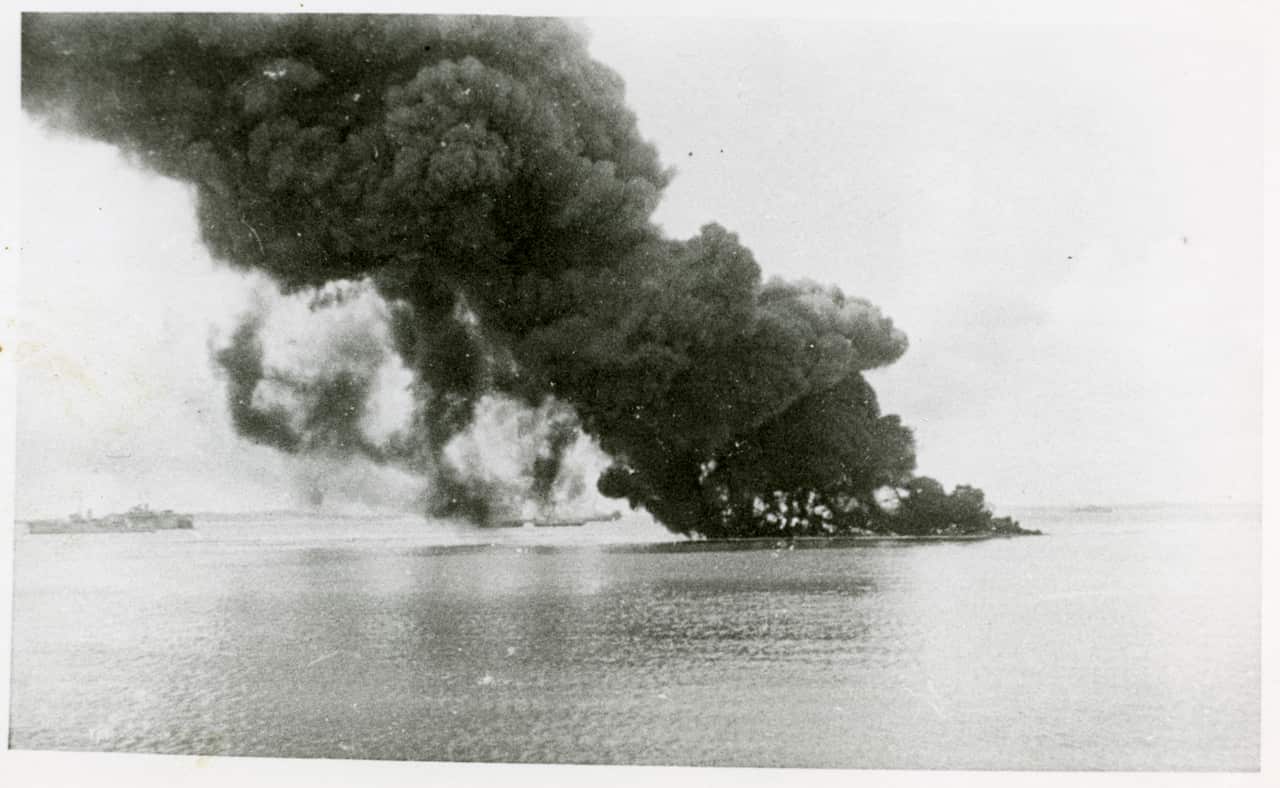 The impact of the first air raid on ships in Darwin Harbour